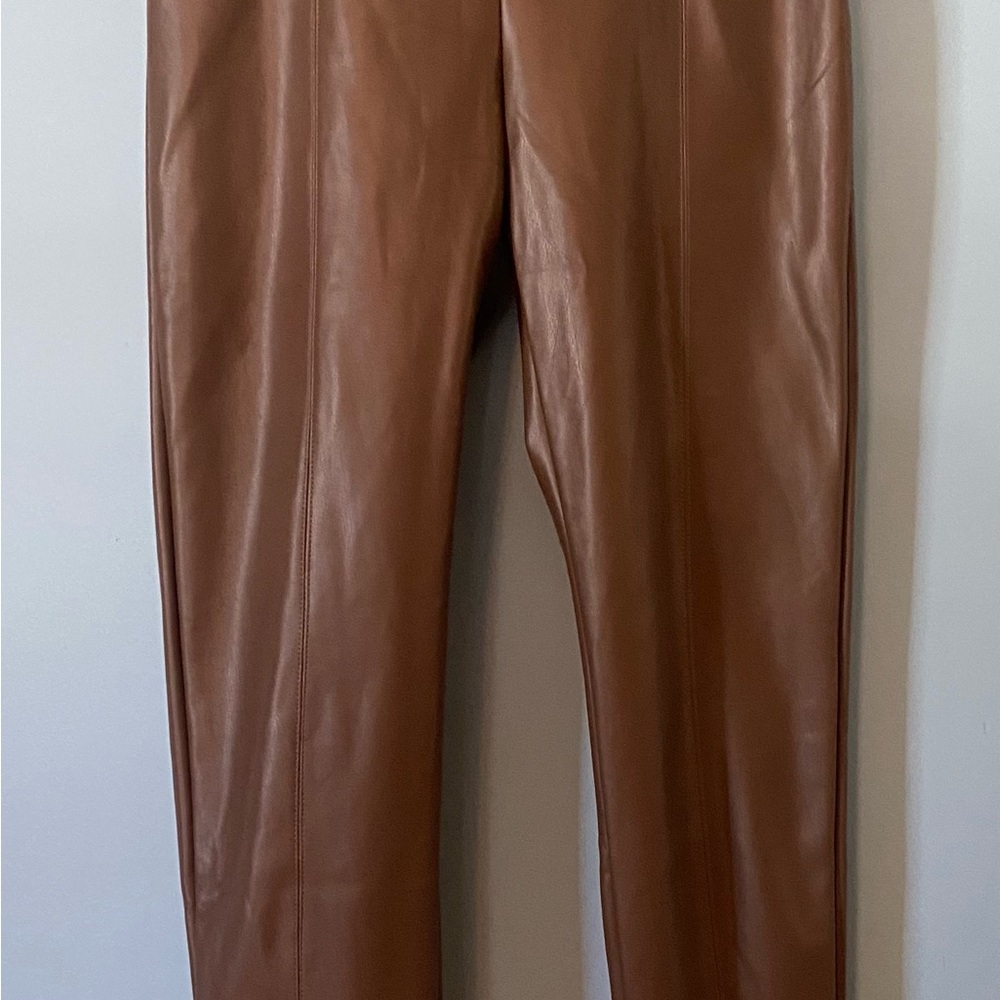 Size L women’s faux leather pants, ankle length, never worn, excellent condition